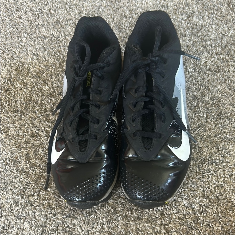 Nike Black, White, and Yellow Sports Cleats